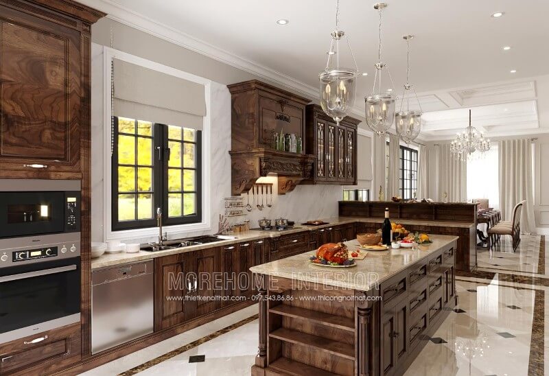 Tủ bếp cao cấp với sự phân chia hợp lí giữa các ngăn tủ tạo sự thuận tiện, chiếc bàn đảo đặt chính giữa vừa có tác dụng làm quầy bar, vừa có tác dụng làm bàn ăn phụ, bạn cũng sẽ không phải lo về vấn đề lưu trữ đồ đạc giúp căn bếp luôn sạch sẽ, gọn gàng, ngăn nắp Thiết kế và sản xuất tủ bếp đẹp