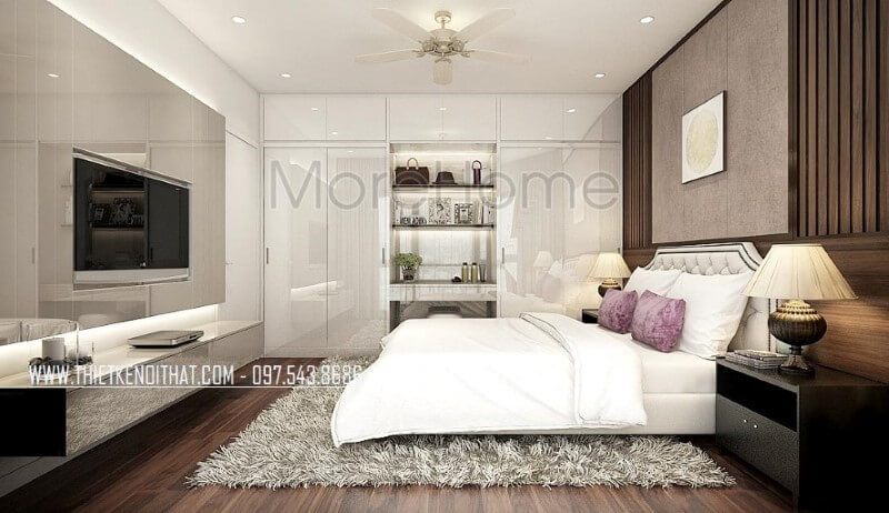 Trang trí nội thất phòng ngủ master đẹp, sang trọng ấn tượng với tủ quần áo hiện đại, giường bọc nệm đương đại kết hợp cùng gỗ ốp tường gỗ óc chó cao cấp.