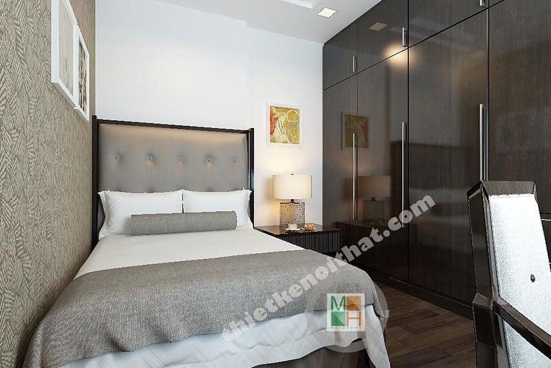 Mẫu tủ quần áo gỗ công nghiệp màu nâu với thiết kế âm tường giúp không gian phòng ngủ được mở rộng hơn