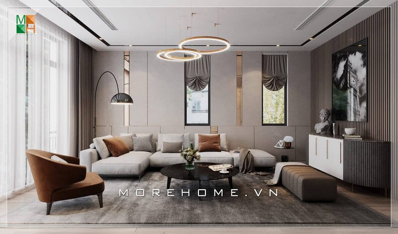 . Bộ sofa phòng khách gồm một ghế chữ L và một ghế đơn được làm bằng gỗ tự nhiên bọc bằng nỉ cao cấp, tạo nên sự trẻ trung và hiện đại cho căn phòng.
